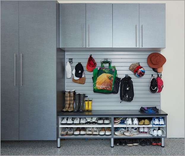Mudroom with cabintes, shelves and hooks