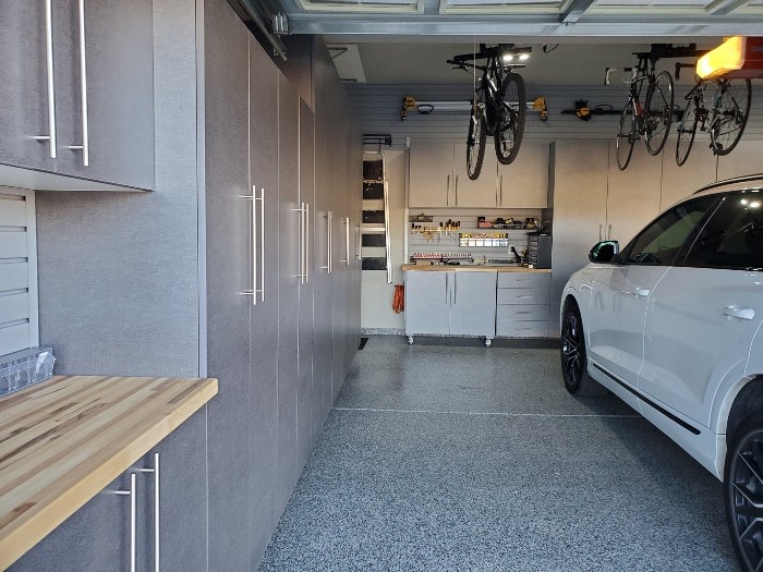 Garage with cabinets and shiny floor 