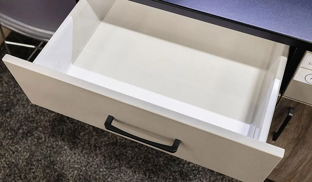 Garage storage cabinet with one white drawer opened