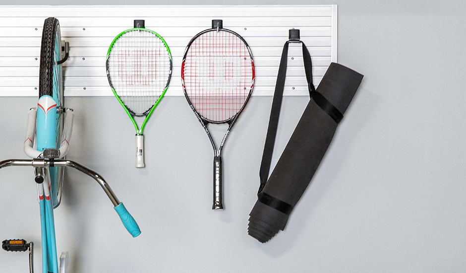 vertical wall storage with sports equipment